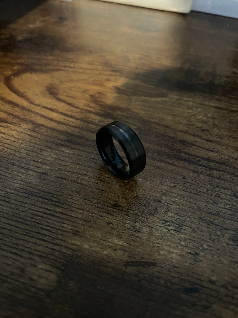 The Blaec Falcon Ring exudes strength and sophistication. Crafted with tungsten, this powerful ring radiates a luxurious aura. Elevate your style with this exclusive piece that symbolizes resilience and durability. 8mm Tungsten Carbide